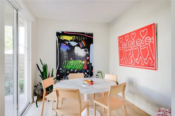 a room with books and a book shelf