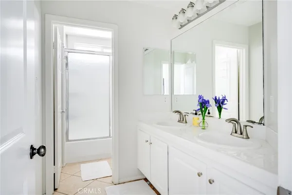 a bedroom with a bed and a closet