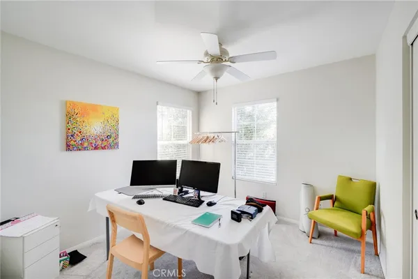 a outdoor living space with furniture and a potted plant