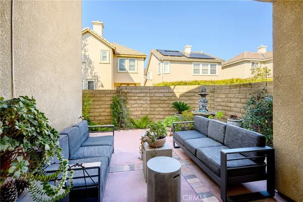 a view of swimming pool with outdoor seating