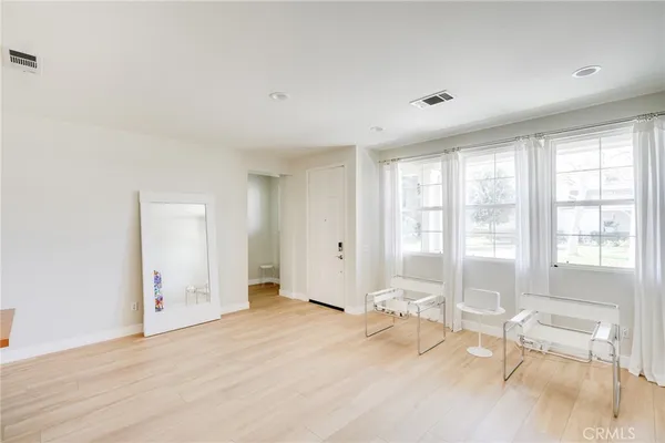 a table room with a table and chairs