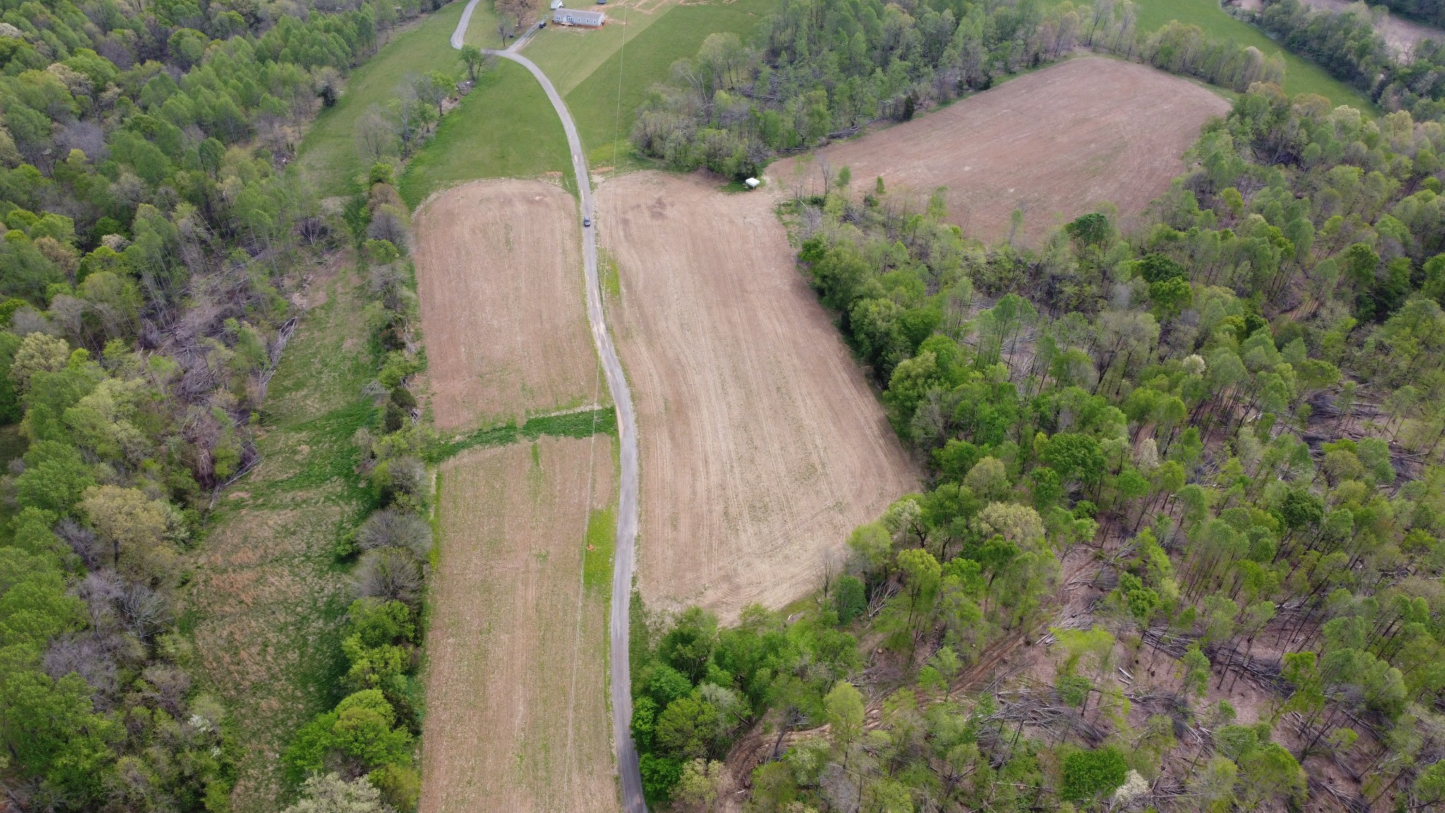 0 Trammel Creek Road Westmoreland, TN 37186 - Photo 3 of 12 an aerial view of a house with a yard and large trees