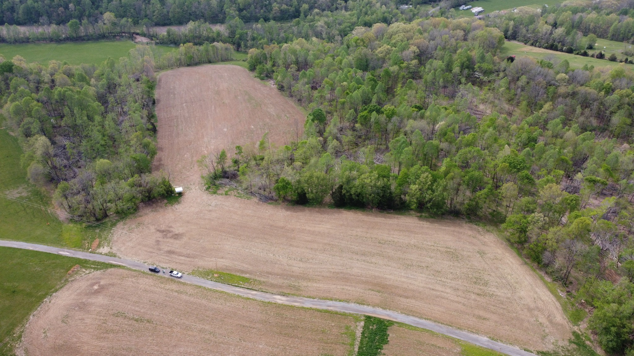 0 Trammel Creek Road Westmoreland, TN 37186 - Photo 4 of 12 an aerial view of a house with a yard and lake view