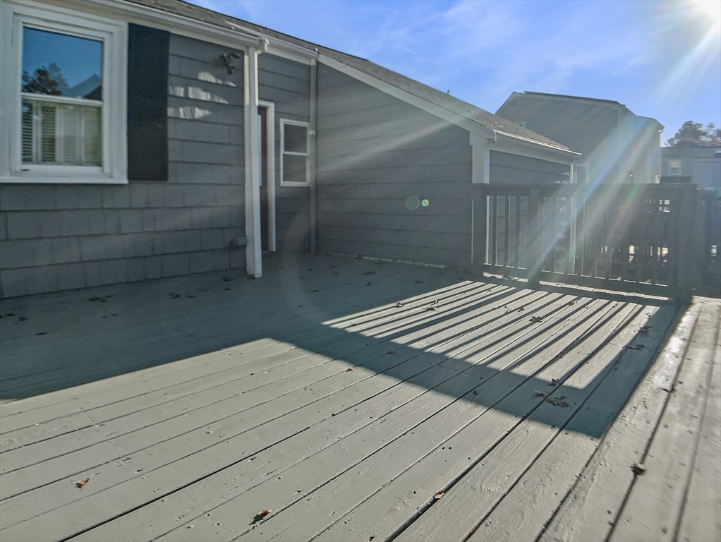 444 Lowell Street Reading, MA 01867 - Photo 34 of 38 a view of backyard with cabin
