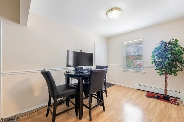a front view of a house with a yard and a garage
