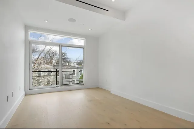 an empty room with windows