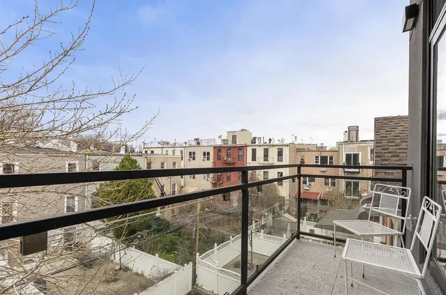a view of city from a balcony