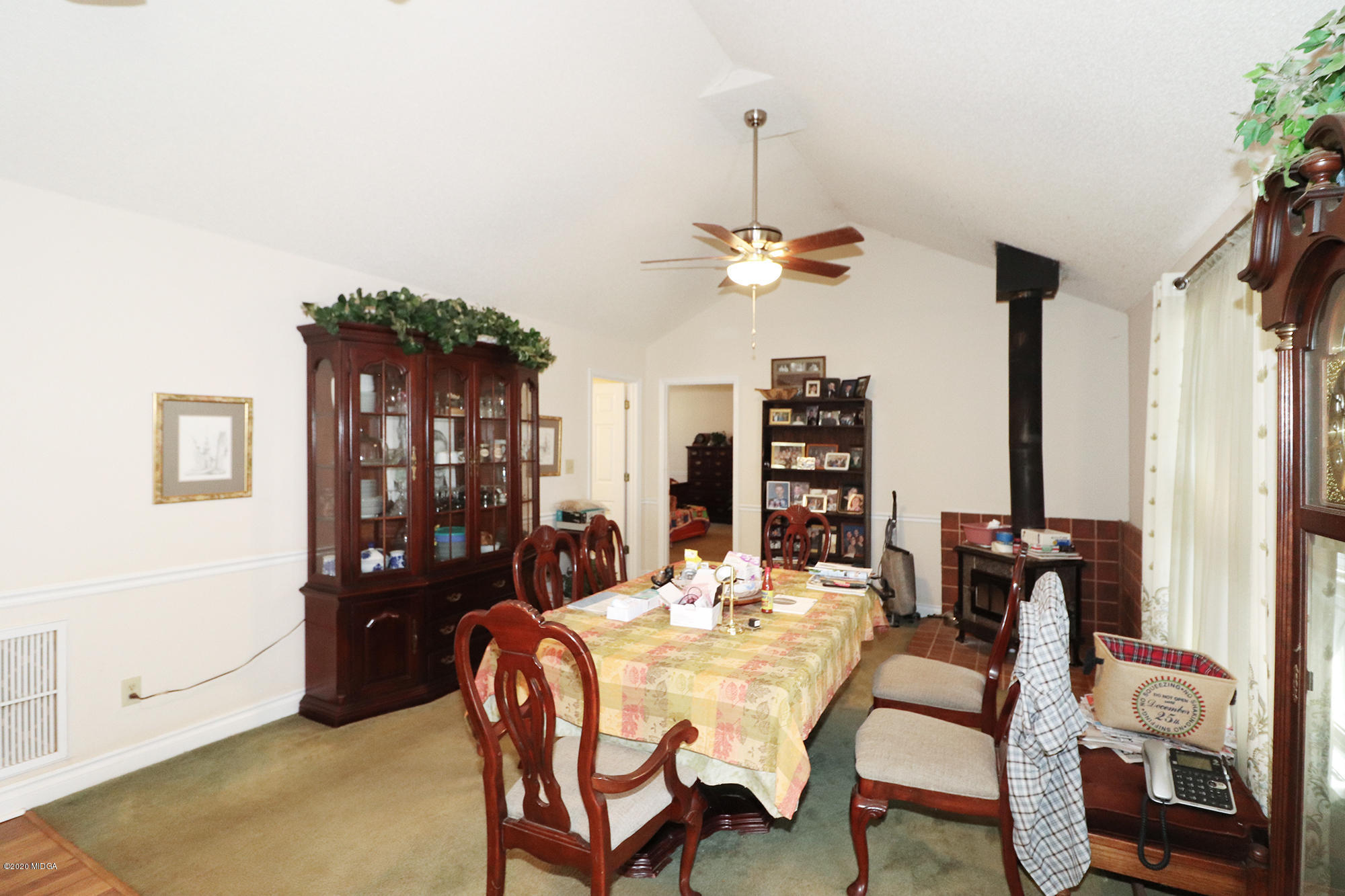 48 Grace Road Knoxville, GA 31050 - Photo 12 of 62 a view of a dining room with furniture and chandelier