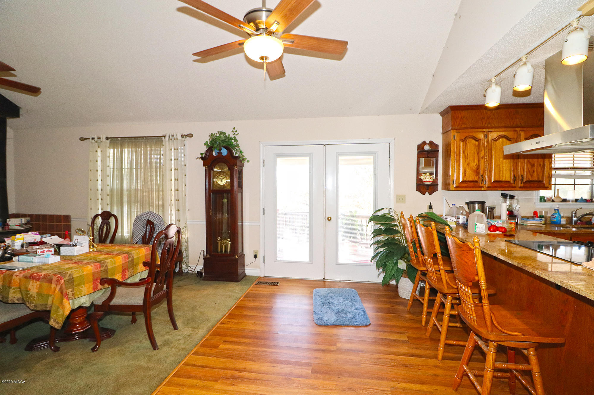 48 Grace Road Knoxville, GA 31050 - Photo 3 of 62 a view of a dining room with furniture and wooden floor