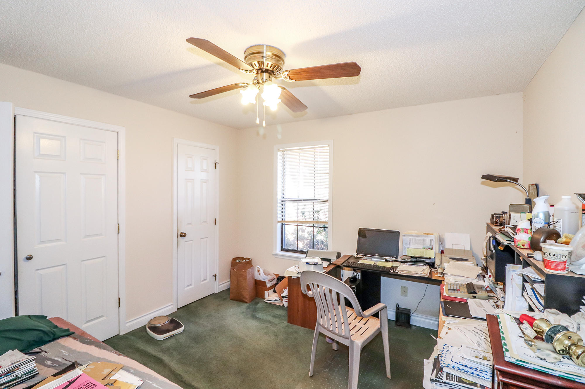 48 Grace Road Knoxville, GA 31050 - Photo 21 of 62 a workspace with furniture and ceiling fan