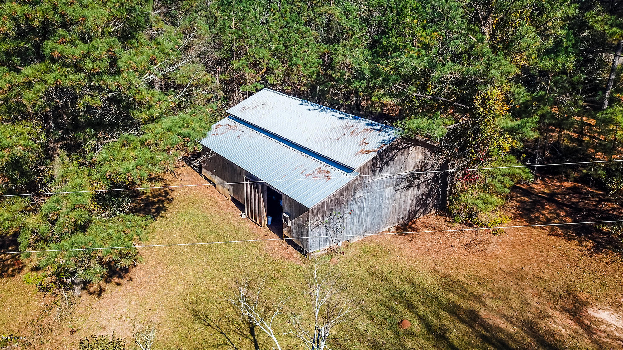 48 Grace Road Knoxville, GA 31050 - Photo 27 of 62 a view of a house with a trees