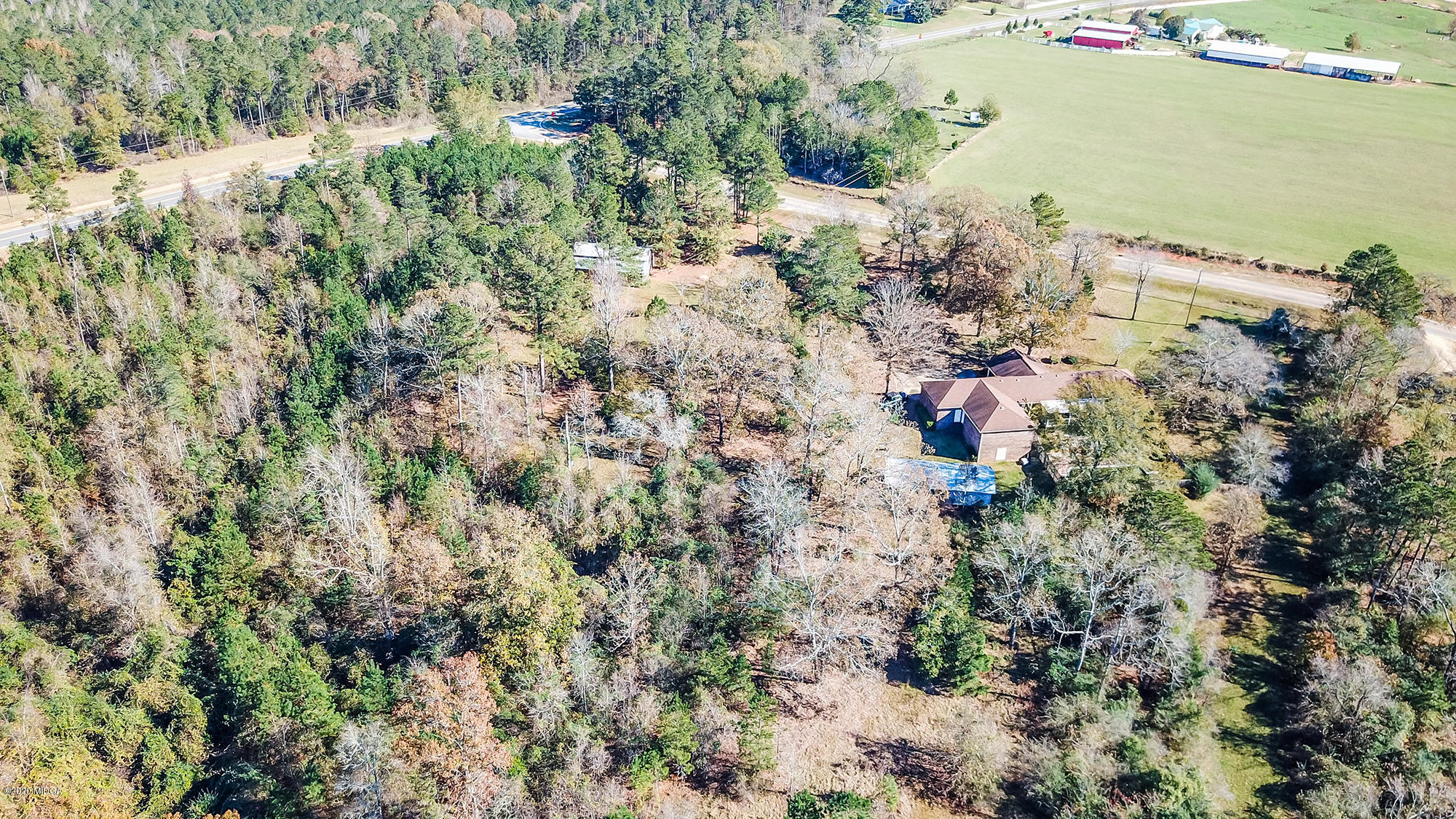 48 Grace Road Knoxville, GA 31050 - Photo 34 of 62 an aerial view of residential houses with outdoor space