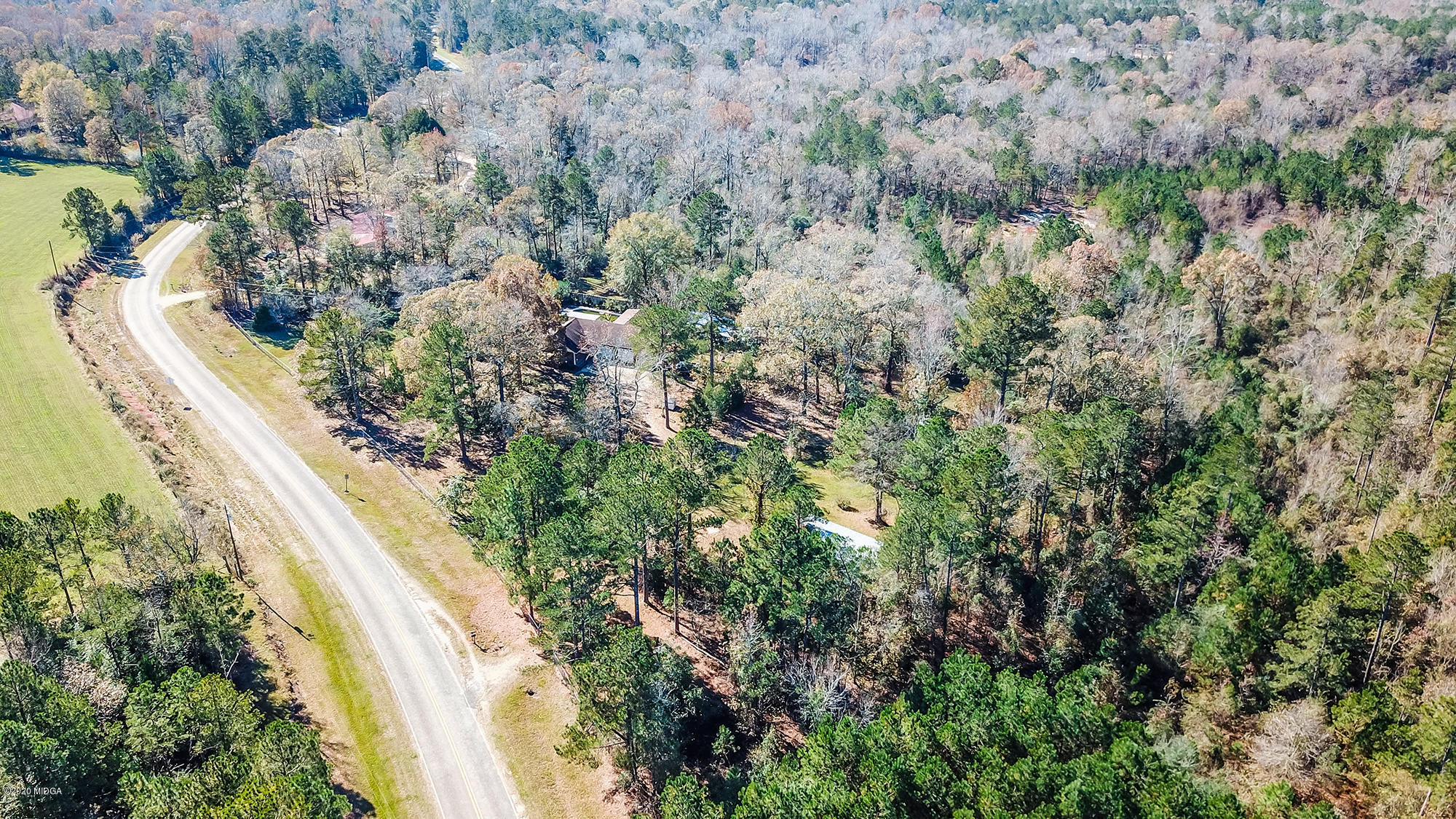 48 Grace Road Knoxville, GA 31050 - Photo 36 of 62 a view of a garden with a tree