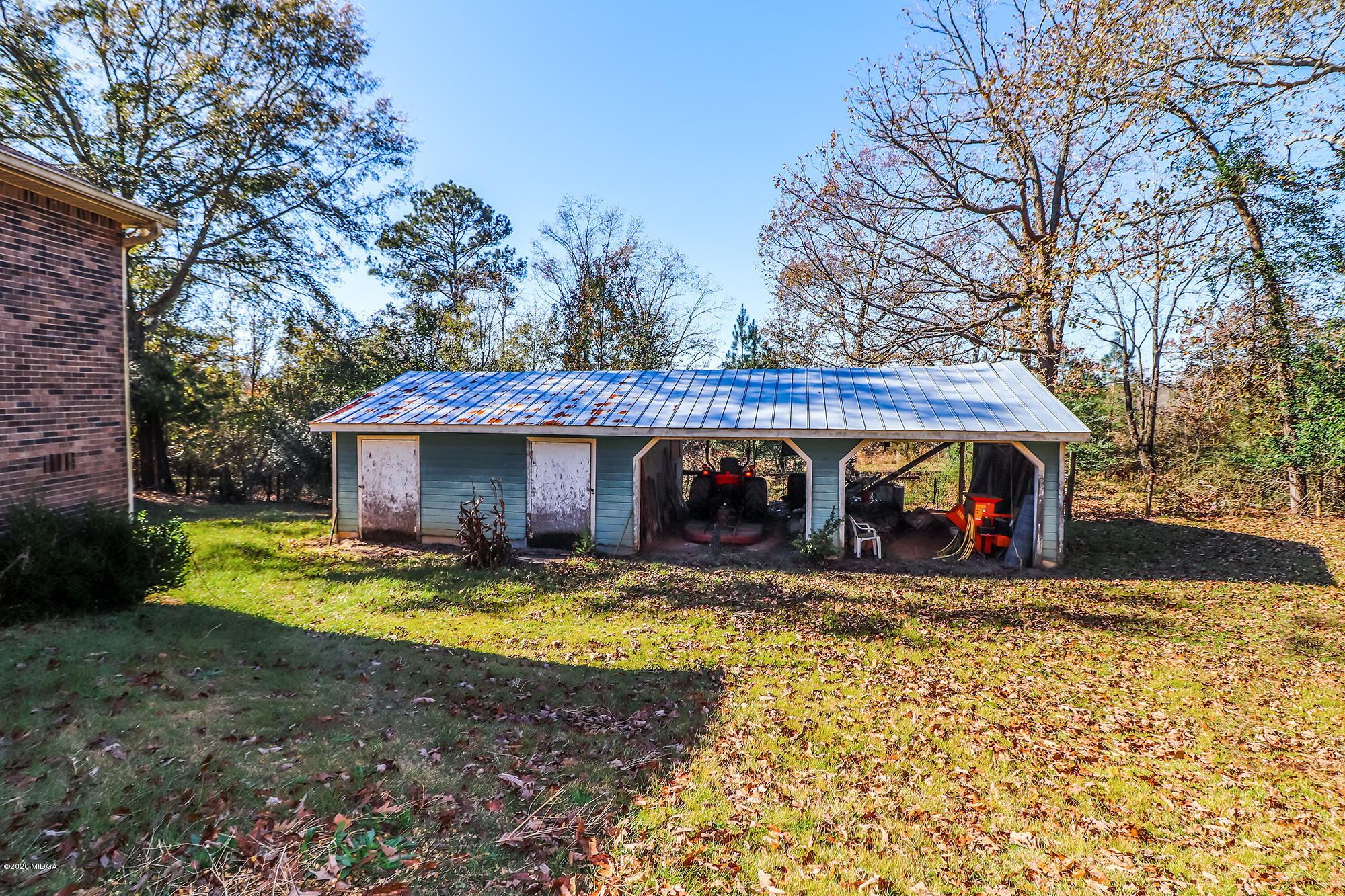 48 Grace Road Knoxville, GA 31050 - Photo 44 of 62 a view of a house with swimming pool in front of it