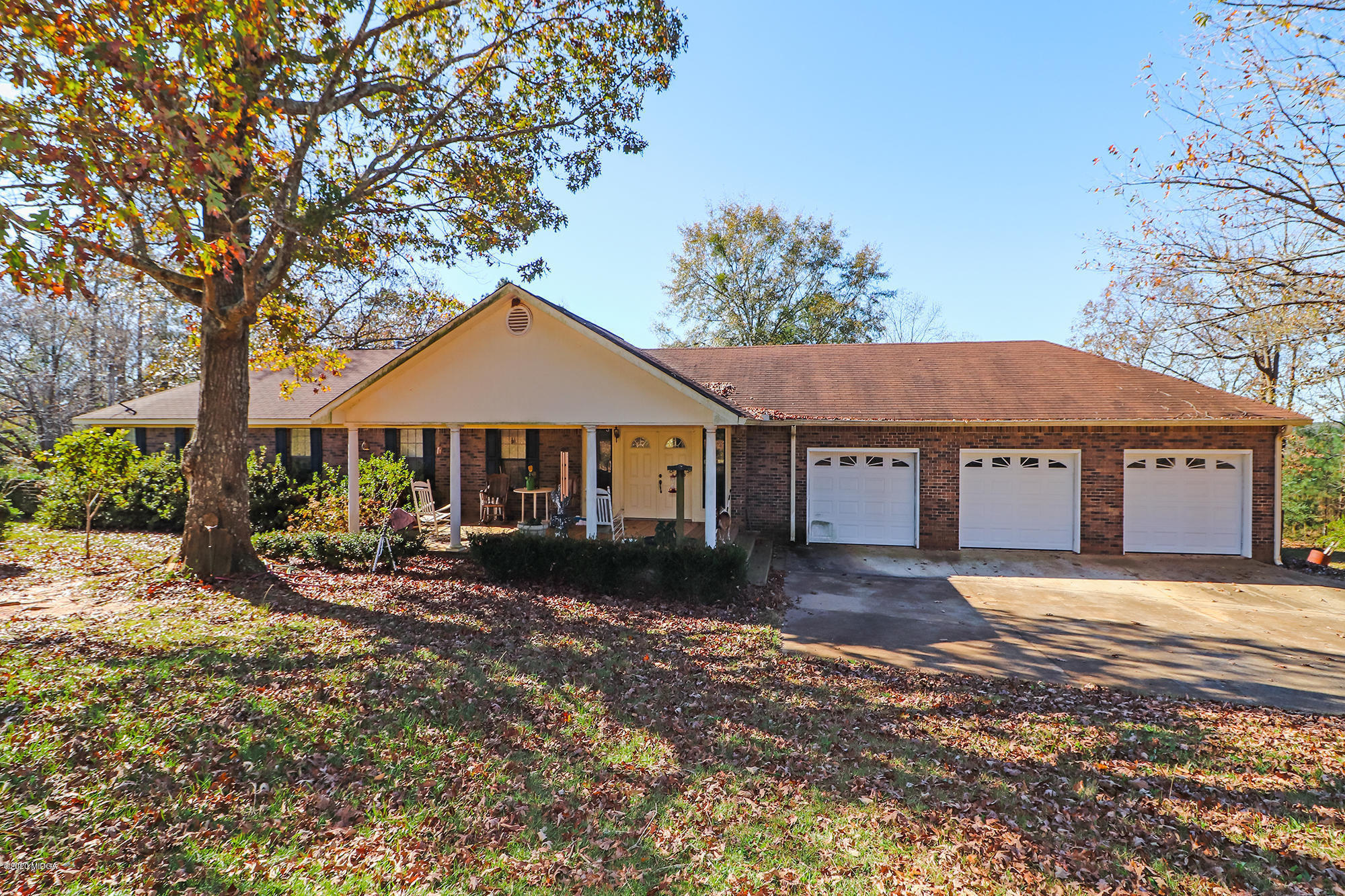 48 Grace Road Knoxville, GA 31050 - Photo 50 of 62 a front view of a house with garden