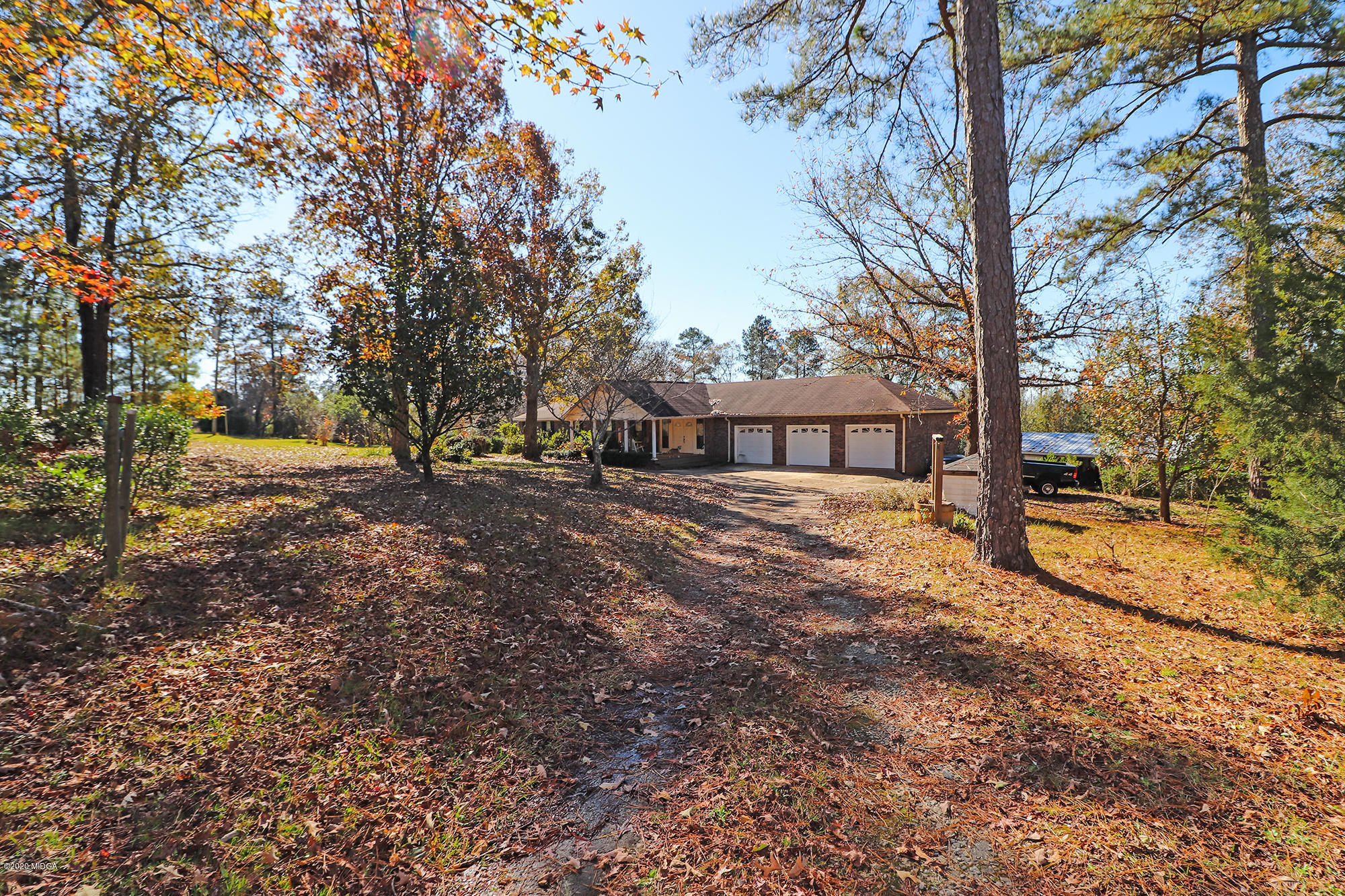 48 Grace Road Knoxville, GA 31050 - Photo 52 of 62 a view of a house with a yard
