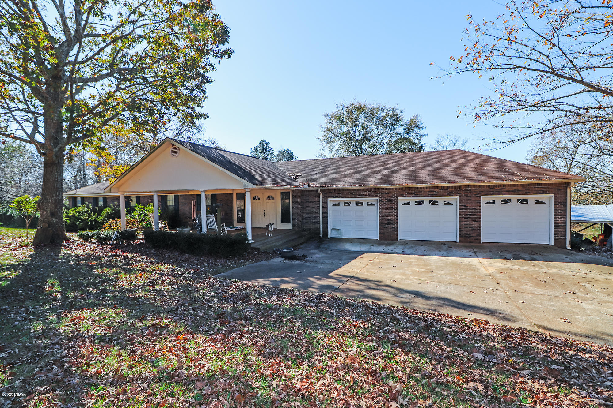 48 Grace Road Knoxville, GA 31050 - Photo 53 of 62 a front view of a house with a yard