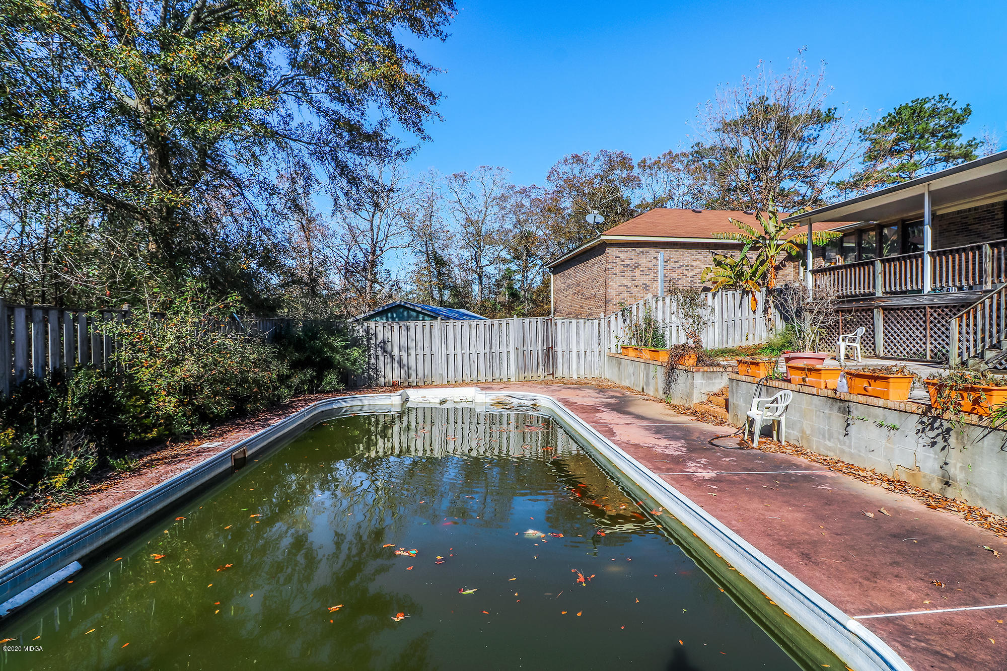 48 Grace Road Knoxville, GA 31050 - Photo 56 of 62 swimming pool view with a outdoor seating