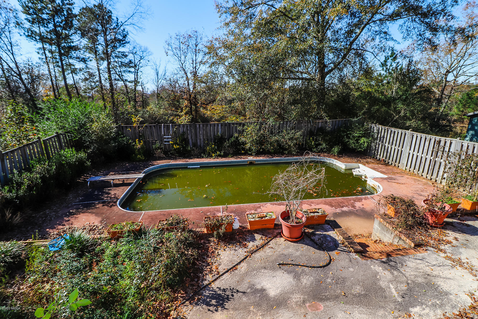 48 Grace Road Knoxville, GA 31050 - Photo 60 of 62 a view of a swimming pool and lounge chair