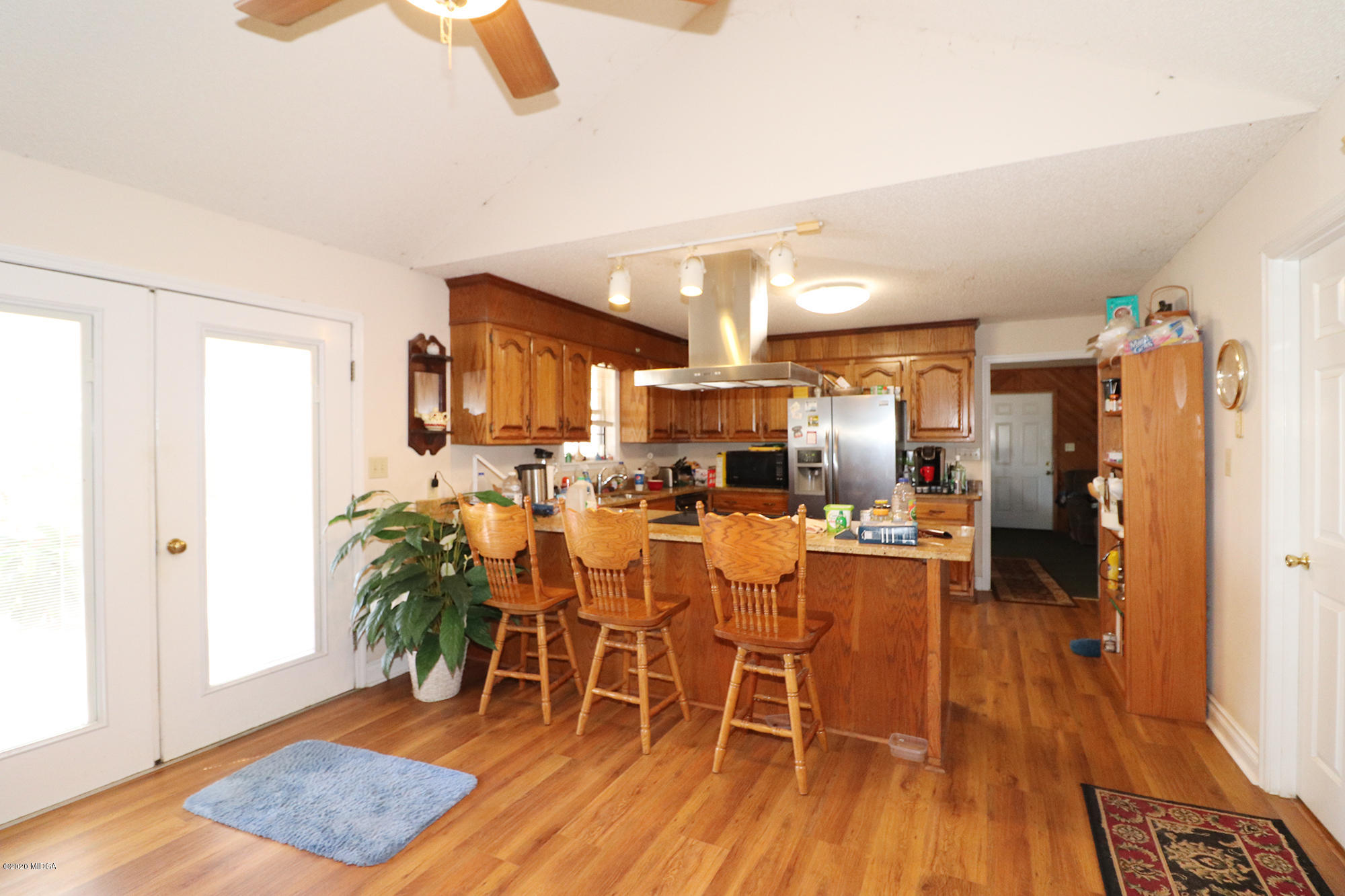 48 Grace Road Knoxville, GA 31050 - Photo 8 of 62 a dining room with furniture and wooden floor