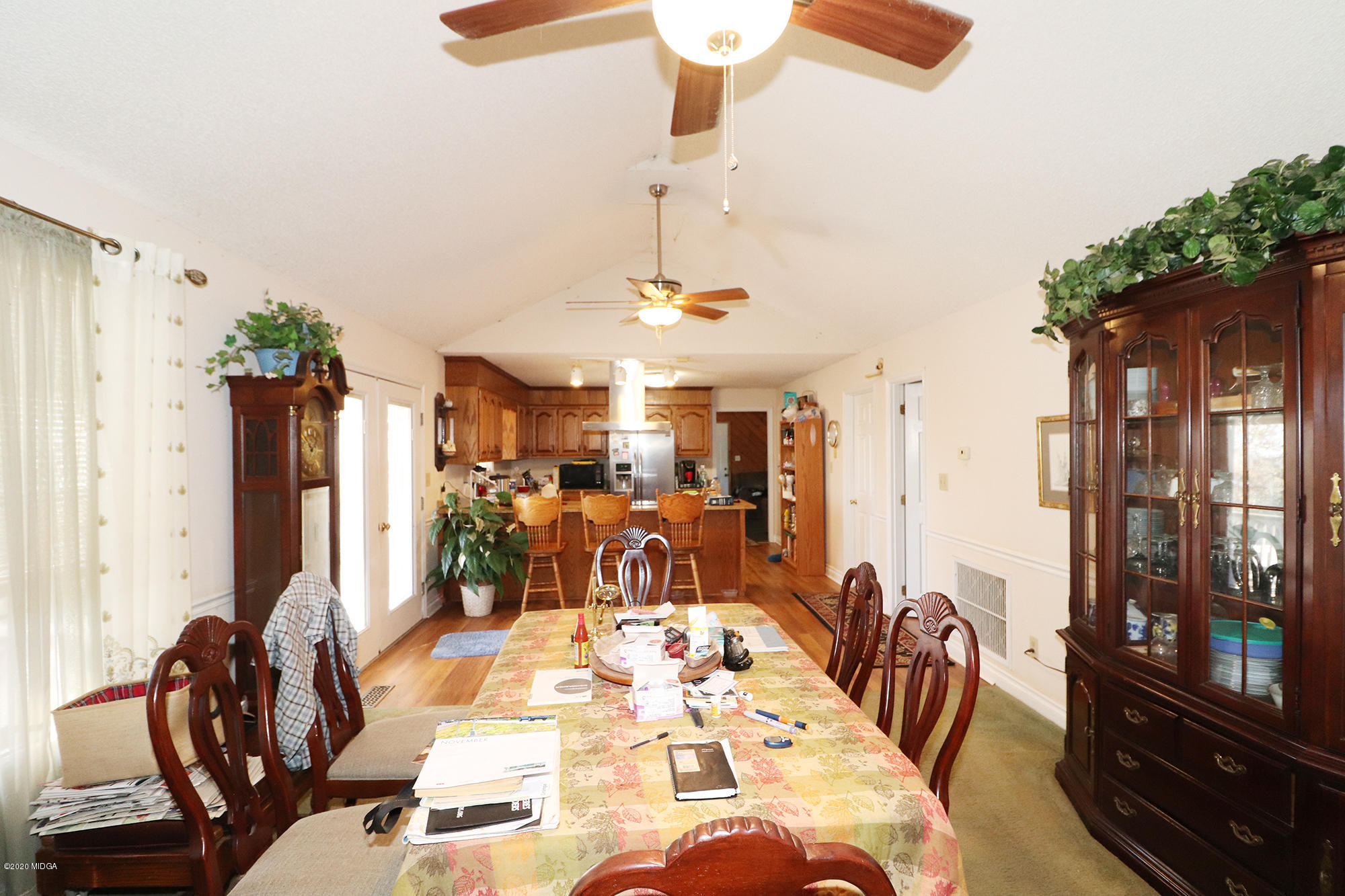 48 Grace Road Knoxville, GA 31050 - Photo 9 of 62 a view of a livingroom with furniture window and wooden floor