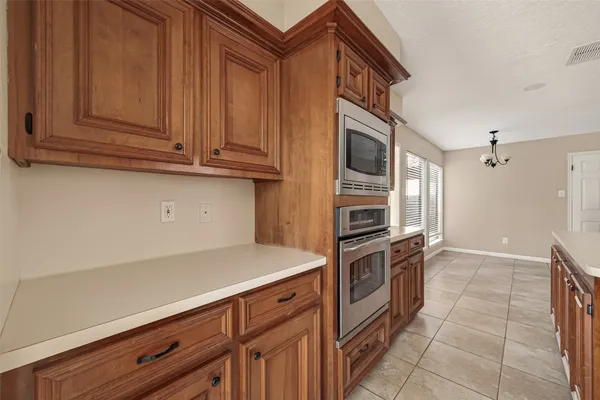 a spacious bathroom with a double vanity sink mirror and