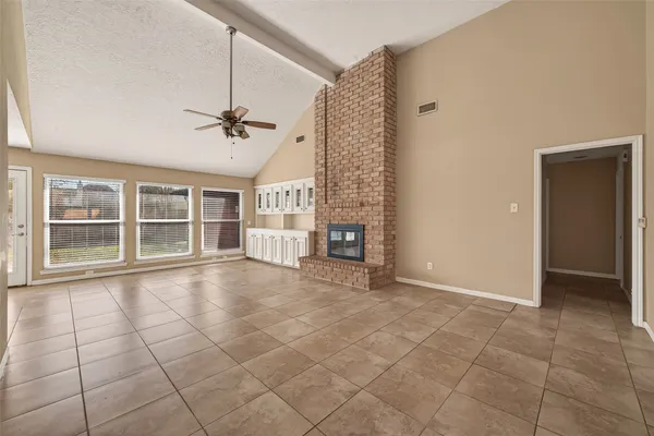 a kitchen with stainless steel appliances a stove a microwave and cabinets
