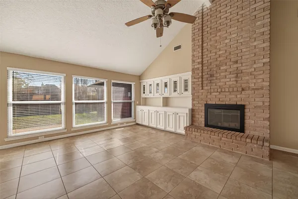 a kitchen with a stove a sink and a refrigerator