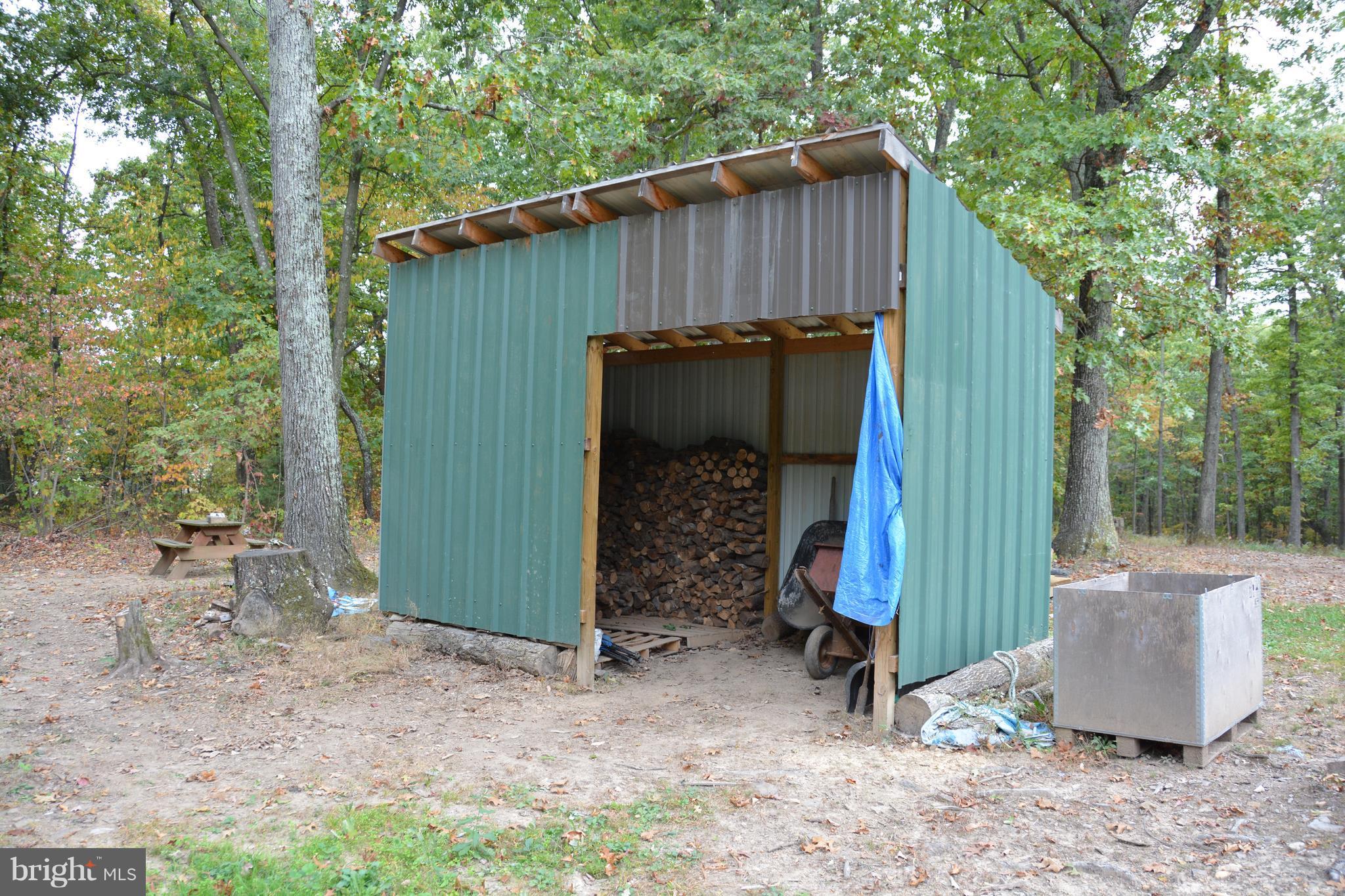 545 Whissens Ridge Road Winchester, VA 22602 - Photo 28 of 30 Woodshed.Keep it dry for the lower level woodstove
