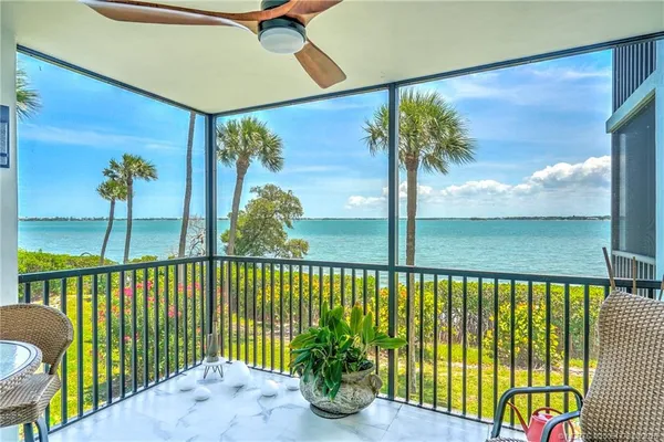a view of a balcony with lake view