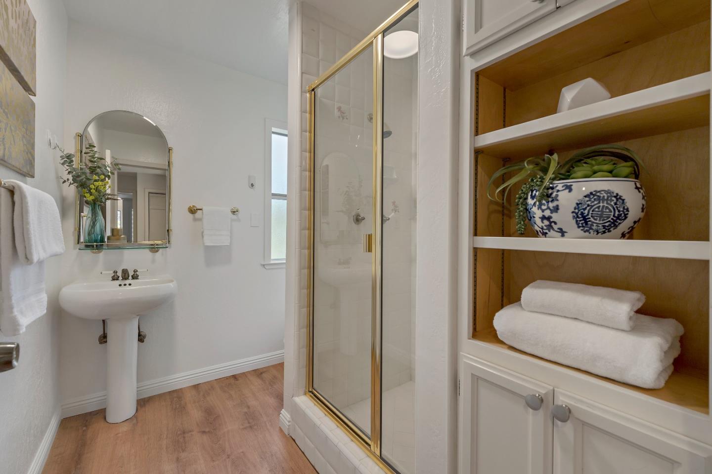 360 Iris Way Palo Alto, CA 94303 - Photo 15 of 28 a bathroom with a sink a toilet and shower