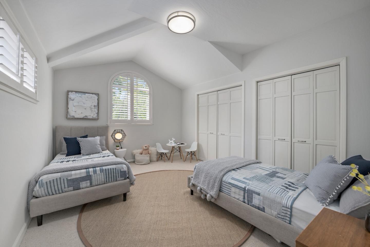 360 Iris Way Palo Alto, CA 94303 - Photo 16 of 28 a spacious bedroom with a bed and window