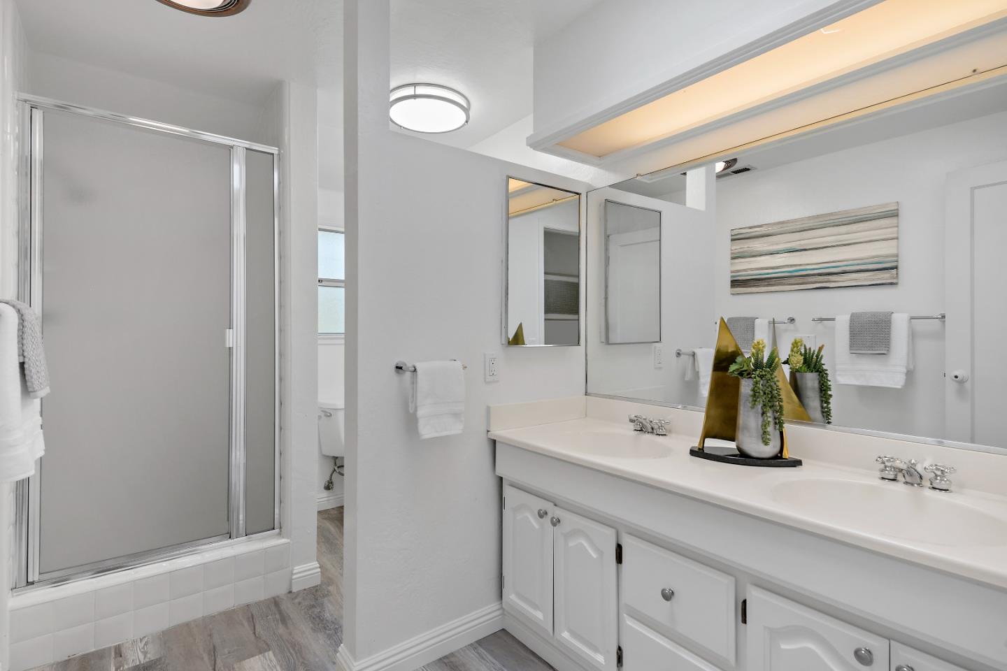 360 Iris Way Palo Alto, CA 94303 - Photo 20 of 28 a bathroom with a sink and a mirror