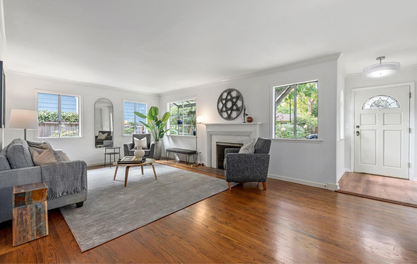360 Iris Way Palo Alto, CA 94303 - Photo 4 of 28 a living room with furniture and a fireplace