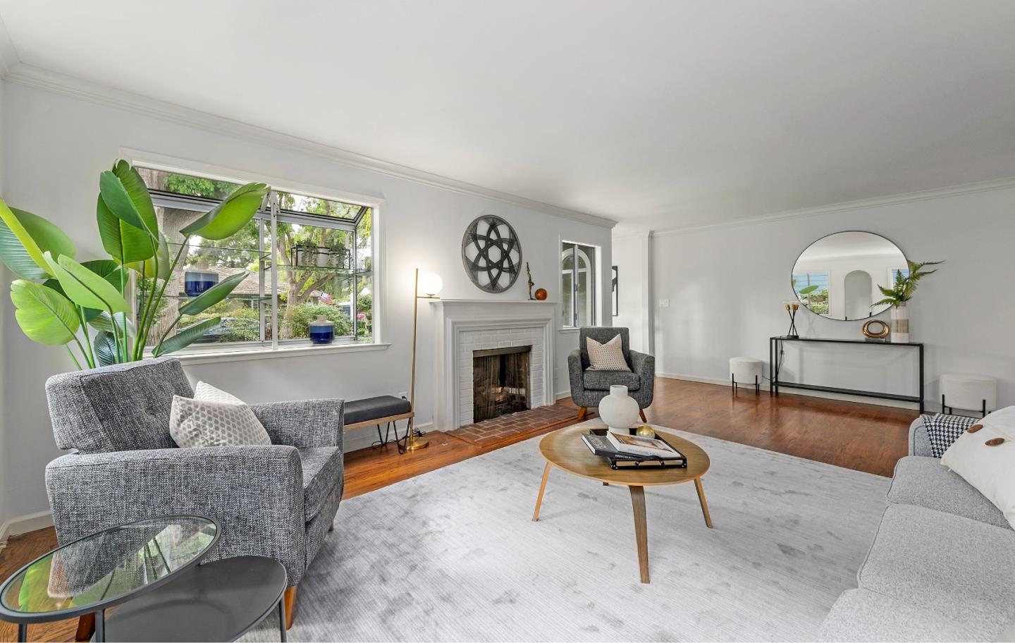 360 Iris Way Palo Alto, CA 94303 - Photo 6 of 28 a living room with furniture a rug and a fireplace