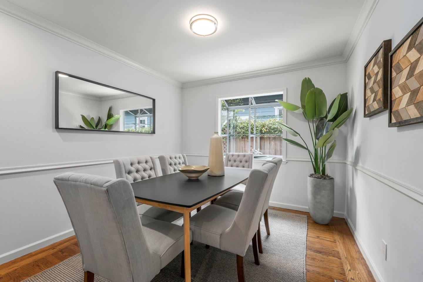 360 Iris Way Palo Alto, CA 94303 - Photo 8 of 28 a dining room with furniture and wooden floor