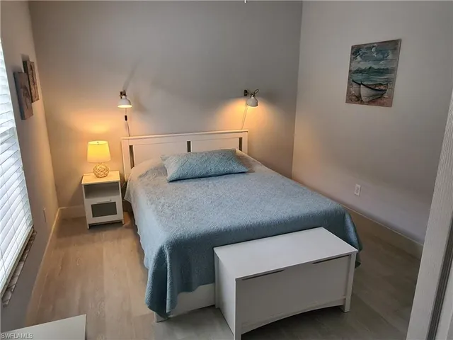 a bathroom with a bathtub and a sink