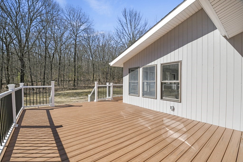 427 Mason Rd Extension Dudley, MA 01571 - Photo 36 of 38 a view of a house with wooden floor