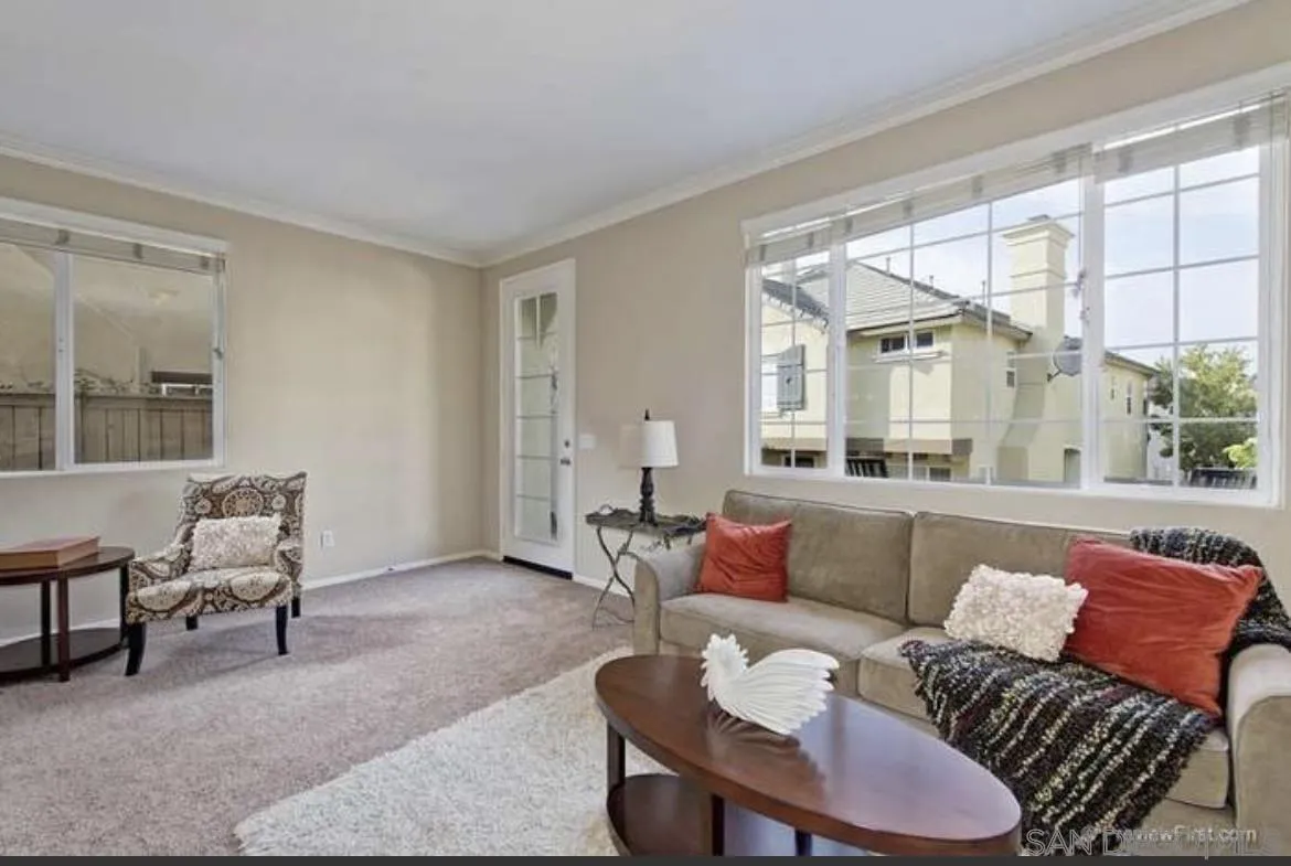 1845 Monaco Drive Chula Vista, CA 91913 - Photo 5 of 10 a living room with furniture and a large window