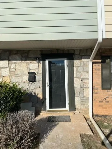 a front view of a house with a garage