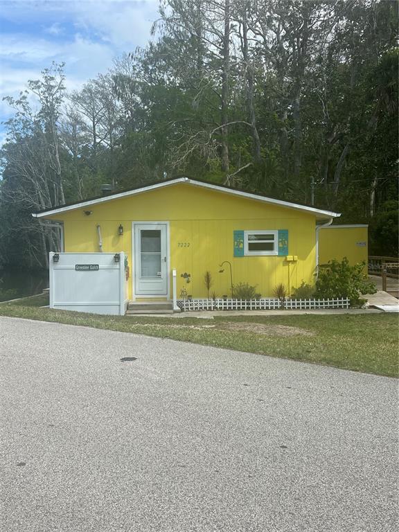 7222 Tropical Drive Weeki Wachee, FL 34607 - Photo 1 of 23 a view of a back yard