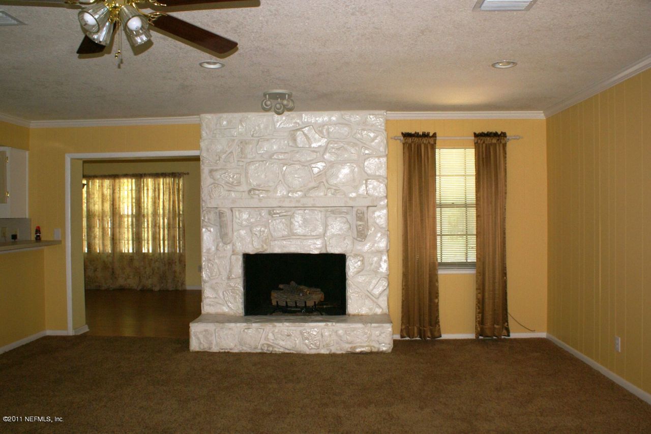 3147 Parental Home Road Jacksonville, FL 32216 - Photo 3 of 6 Fireplace in Family Room