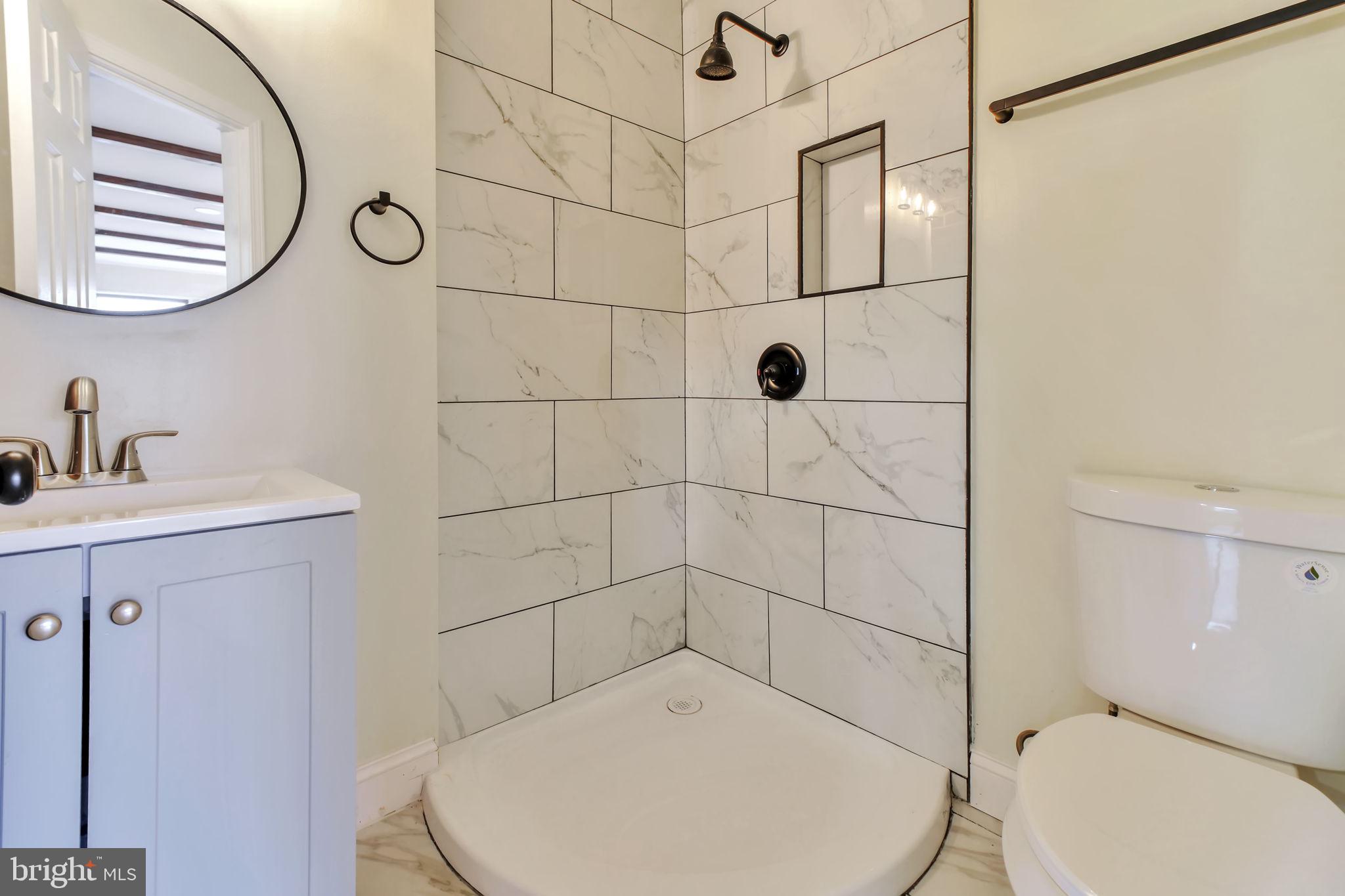 3509 Annandale Road Annandale, VA 22003 - Photo 10 of 30 a bathroom with a toilet and a sink