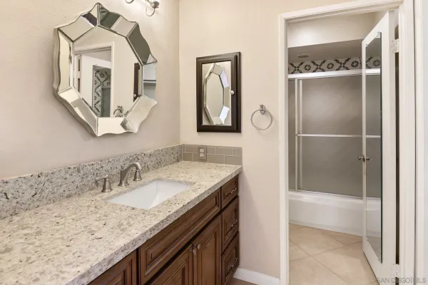 a bathroom with a shower and a toilet
