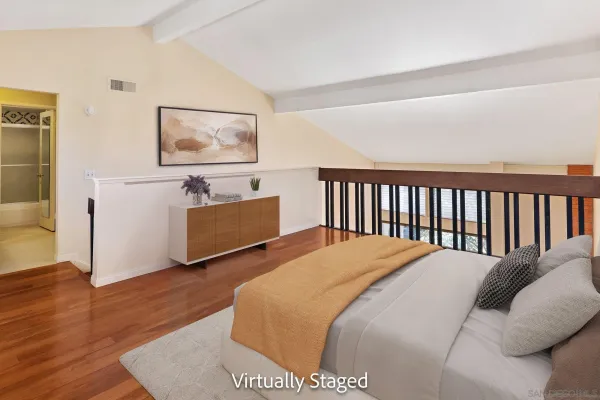 a bed room with a bed and a night stand