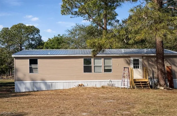 a view of a house with a patio