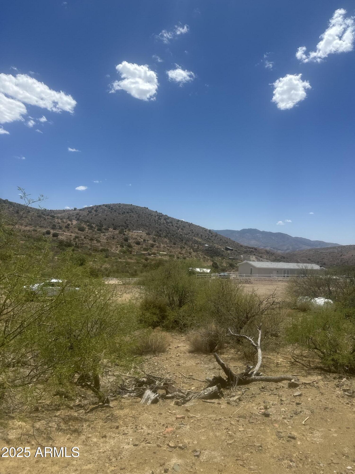 98 Copper Canyon Ranch Road Globe, AZ 85501 - Photo 12 of 20 a view of a lake from a yard
