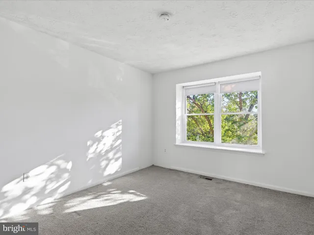 an empty room with an entryway