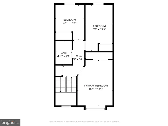 a view of a hallway with a dining room