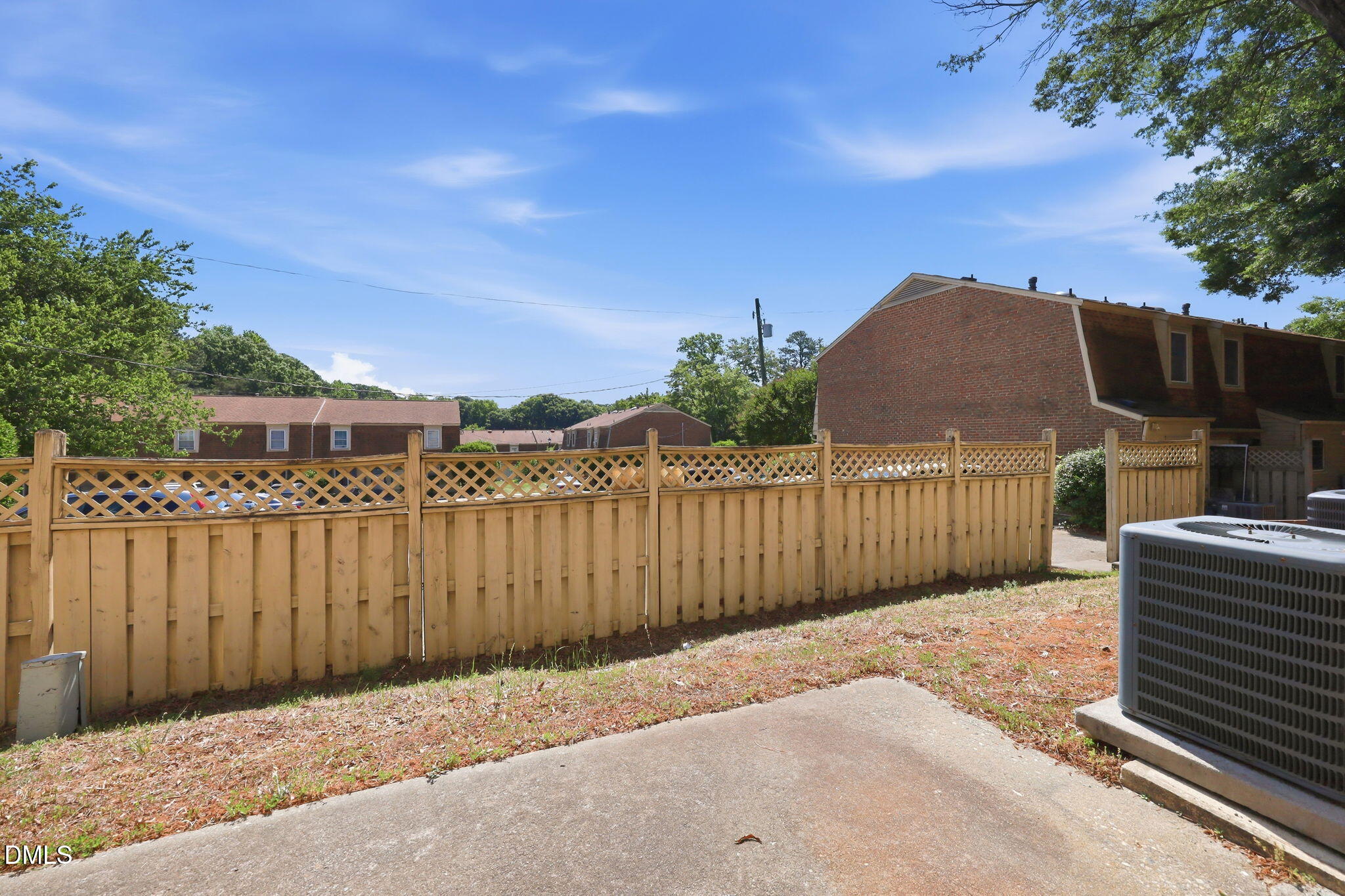 145 Jones Franklin Road, Unit D Raleigh, NC 27606 - Photo 18 of 23 a backyard of a house